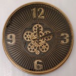 Radarklok met draaiende raderen koper